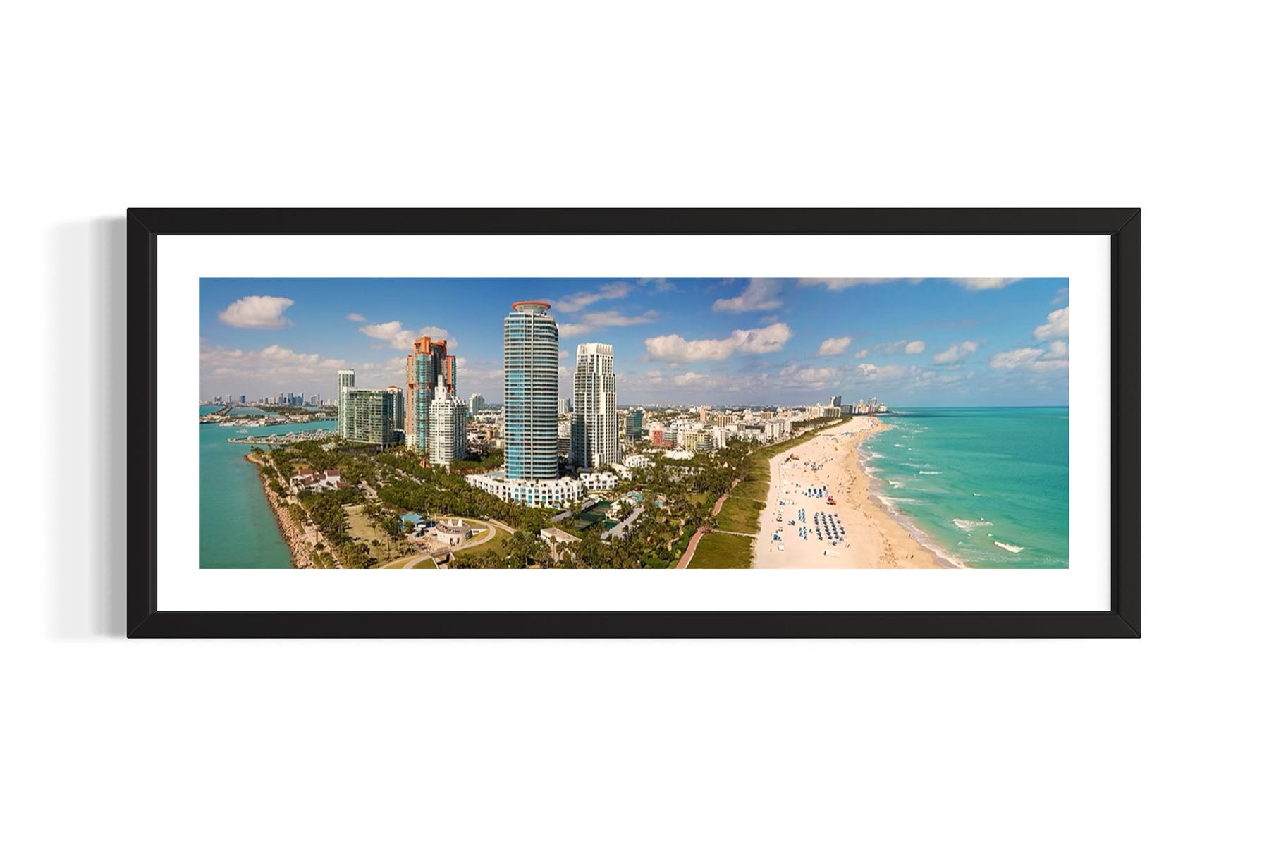 Framed aerial panoramic photo of Miami Beach, Florida with skyscrapers and beach by Evan Reinheimer.